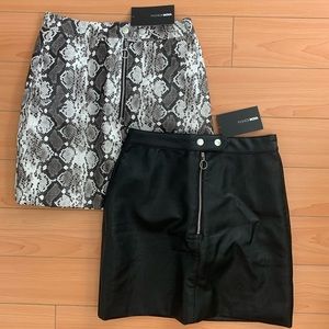 Black and snakeskin pleather mini skirts